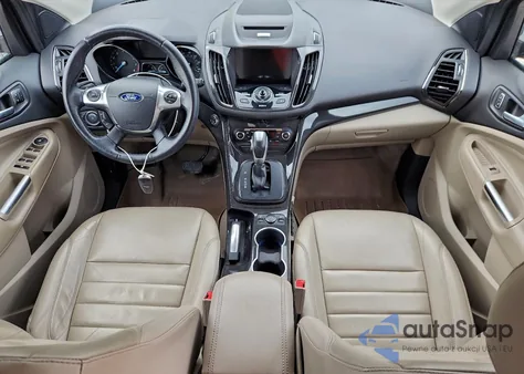 2016 Ford Escape Titanium z USA, uszkodzony, nr VIN 1FMCU0JX0GUB58835